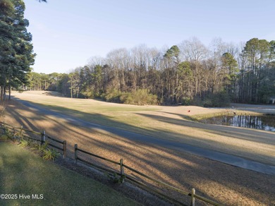Perfectly positioned on a dog-leg right par five of the Seven on Seven Lakes Country Club in North Carolina - for sale on GolfHomes.com, golf home, golf lot