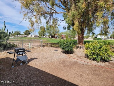 This is a lovely & quaint 2014 3 bedroom 2 bath furnished home on 3 Parks Fairways in Arizona - for sale on GolfHomes.com, golf home, golf lot