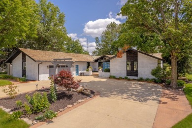 This stunning home boasts 5 bedrooms, 3.5 baths situated on .83 on Pheasant Ridge Municipal Golf Course in Iowa - for sale on GolfHomes.com, golf home, golf lot