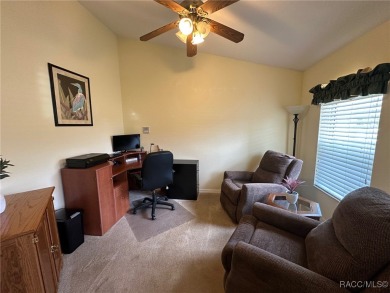This beautiful custom home features three bedrooms and a on Citrus Springs Country Club in Florida - for sale on GolfHomes.com, golf home, golf lot