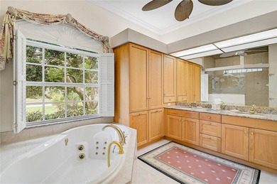 Step into the exclusive Enclave neighborhood of Calusa Lakes on Calusa Lakes Golf Club in Florida - for sale on GolfHomes.com, golf home, golf lot