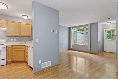 Move-in ready interior townhome. Main floor features living room on Chomonix Golf Course in Minnesota - for sale on GolfHomes.com, golf home, golf lot
