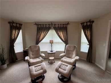 This beautiful custom home features three bedrooms and a on Citrus Springs Country Club in Florida - for sale on GolfHomes.com, golf home, golf lot