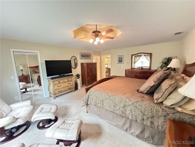 This beautiful custom home features three bedrooms and a on Citrus Springs Country Club in Florida - for sale on GolfHomes.com, golf home, golf lot