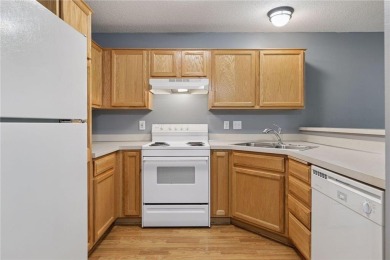 Move-in ready interior townhome. Main floor features living room on Chomonix Golf Course in Minnesota - for sale on GolfHomes.com, golf home, golf lot