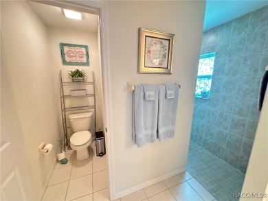 This beautiful custom home features three bedrooms and a on Citrus Springs Country Club in Florida - for sale on GolfHomes.com, golf home, golf lot