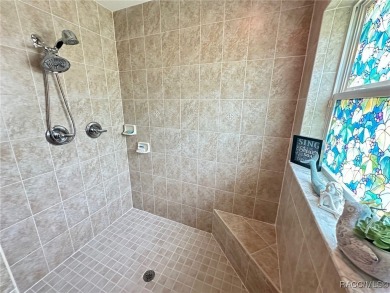 This beautiful custom home features three bedrooms and a on Citrus Springs Country Club in Florida - for sale on GolfHomes.com, golf home, golf lot