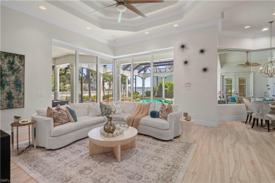 Sun-Soaked Sophistication on the Shores of Miromar Lakes! Tucked on Miromar Lakes Golf Club in Florida - for sale on GolfHomes.com, golf home, golf lot