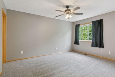 Move-in ready interior townhome. Main floor features living room on Chomonix Golf Course in Minnesota - for sale on GolfHomes.com, golf home, golf lot