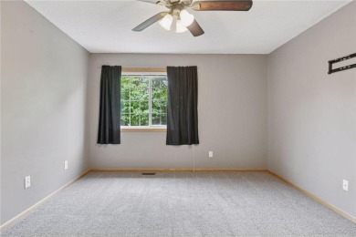 Move-in ready interior townhome. Main floor features living room on Chomonix Golf Course in Minnesota - for sale on GolfHomes.com, golf home, golf lot