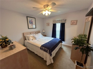 This beautiful custom home features three bedrooms and a on Citrus Springs Country Club in Florida - for sale on GolfHomes.com, golf home, golf lot