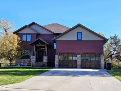 Enjoy the stunning views in this exquisite home which overlooks on Miles City Town and Country Club in Montana - for sale on GolfHomes.com, golf home, golf lot