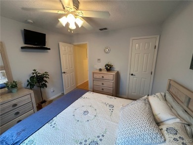 This beautiful custom home features three bedrooms and a on Citrus Springs Country Club in Florida - for sale on GolfHomes.com, golf home, golf lot