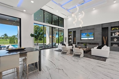 State-of-the-art custom estate, located within the prestigious on Coral Ridge Country Club in Florida - for sale on GolfHomes.com, golf home, golf lot