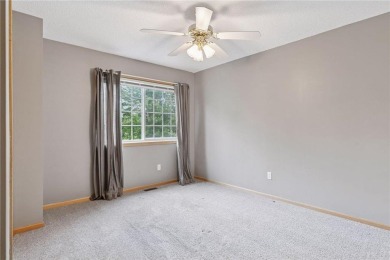Move-in ready interior townhome. Main floor features living room on Chomonix Golf Course in Minnesota - for sale on GolfHomes.com, golf home, golf lot