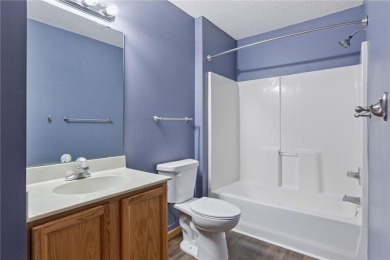 Move-in ready interior townhome. Main floor features living room on Chomonix Golf Course in Minnesota - for sale on GolfHomes.com, golf home, golf lot