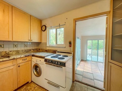 Charming Single-Family Home in Dunedin, FL - A Perfect Blend of on The Dunedin Country Club in Florida - for sale on GolfHomes.com, golf home, golf lot