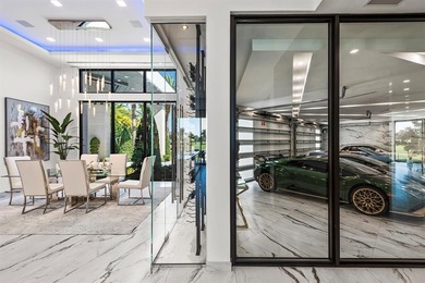 State-of-the-art custom estate, located within the prestigious on Coral Ridge Country Club in Florida - for sale on GolfHomes.com, golf home, golf lot