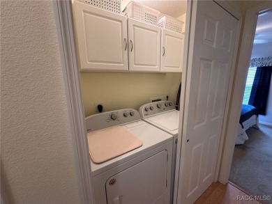 This beautiful custom home features three bedrooms and a on Citrus Springs Country Club in Florida - for sale on GolfHomes.com, golf home, golf lot
