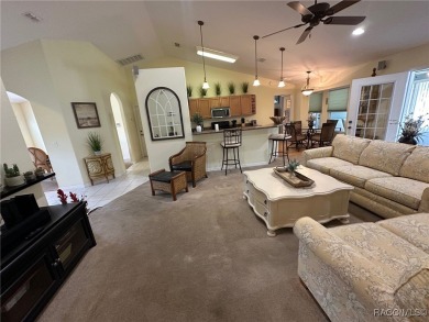 This beautiful custom home features three bedrooms and a on Citrus Springs Country Club in Florida - for sale on GolfHomes.com, golf home, golf lot