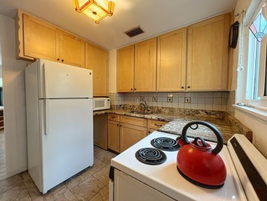 Charming Single-Family Home in Dunedin, FL - A Perfect Blend of on The Dunedin Country Club in Florida - for sale on GolfHomes.com, golf home, golf lot