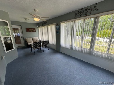 This beautiful custom home features three bedrooms and a on Citrus Springs Country Club in Florida - for sale on GolfHomes.com, golf home, golf lot
