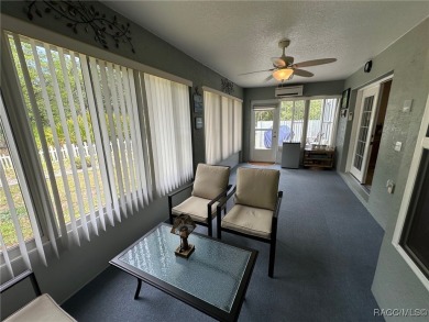 This beautiful custom home features three bedrooms and a on Citrus Springs Country Club in Florida - for sale on GolfHomes.com, golf home, golf lot
