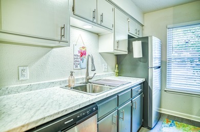 Updated Desoto Courts townhome...This 2 bedroom 1.5 bath beauty on DeSoto Golf Course in Arkansas - for sale on GolfHomes.com, golf home, golf lot