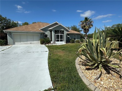 This beautiful custom home features three bedrooms and a on Citrus Springs Country Club in Florida - for sale on GolfHomes.com, golf home, golf lot