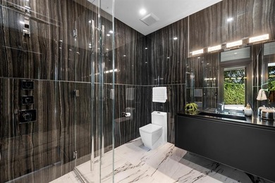 State-of-the-art custom estate, located within the prestigious on Coral Ridge Country Club in Florida - for sale on GolfHomes.com, golf home, golf lot