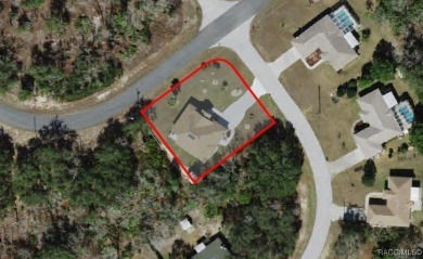 This beautiful custom home features three bedrooms and a on Citrus Springs Country Club in Florida - for sale on GolfHomes.com, golf home, golf lot