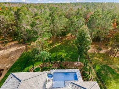Welcome to this stunning contemporary masterpiece that on Bella Collina Golf Club in Florida - for sale on GolfHomes.com, golf home, golf lot