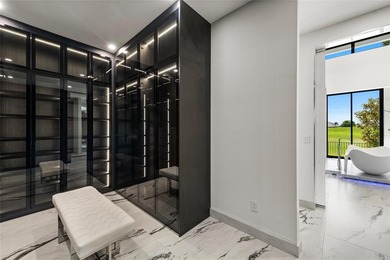 State-of-the-art custom estate, located within the prestigious on Coral Ridge Country Club in Florida - for sale on GolfHomes.com, golf home, golf lot