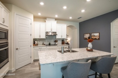 Exquisite 3-Bed, 3-Bath. 3-Car Garage Retreat in Halifax on Halifax Plantation Golf Club in Florida - for sale on GolfHomes.com, golf home, golf lot