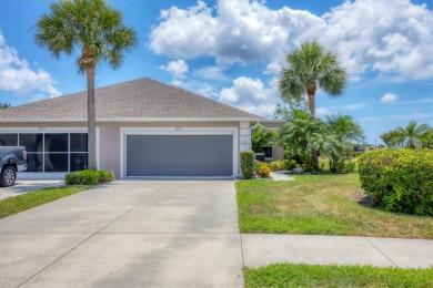 Nestled in the highly sought after gated community of Villas of on Sabal Trace Golf and Country Club in Florida - for sale on GolfHomes.com, golf home, golf lot