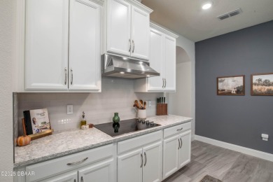 Exquisite 3-Bed, 3-Bath. 3-Car Garage Retreat in Halifax on Halifax Plantation Golf Club in Florida - for sale on GolfHomes.com, golf home, golf lot