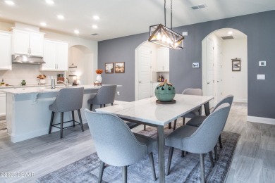 Exquisite 3-Bed, 3-Bath. 3-Car Garage Retreat in Halifax on Halifax Plantation Golf Club in Florida - for sale on GolfHomes.com, golf home, golf lot
