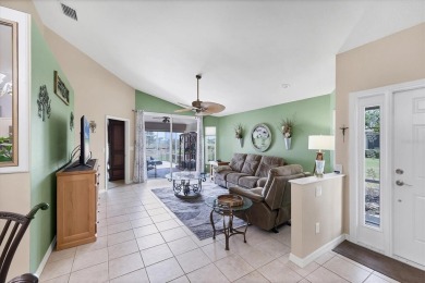 Nestled in the highly sought after gated community of Villas of on Sabal Trace Golf and Country Club in Florida - for sale on GolfHomes.com, golf home, golf lot