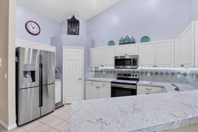 Nestled in the highly sought after gated community of Villas of on Sabal Trace Golf and Country Club in Florida - for sale on GolfHomes.com, golf home, golf lot