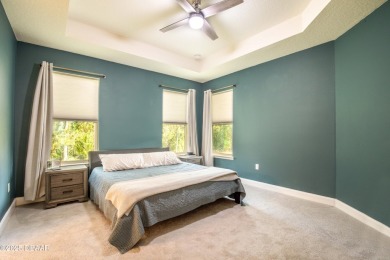 Exquisite 3-Bed, 3-Bath. 3-Car Garage Retreat in Halifax on Halifax Plantation Golf Club in Florida - for sale on GolfHomes.com, golf home, golf lot