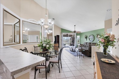 Nestled in the highly sought after gated community of Villas of on Sabal Trace Golf and Country Club in Florida - for sale on GolfHomes.com, golf home, golf lot