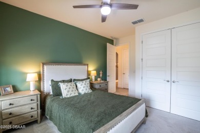 Exquisite 3-Bed, 3-Bath. 3-Car Garage Retreat in Halifax on Halifax Plantation Golf Club in Florida - for sale on GolfHomes.com, golf home, golf lot