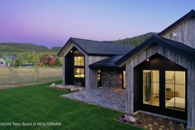 The stunning architecture of this newly constructed ultimate on Teton Springs Resort and Club in Idaho - for sale on GolfHomes.com, golf home, golf lot