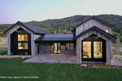 The stunning architecture of this newly constructed ultimate on Teton Springs Resort and Club in Idaho - for sale on GolfHomes.com, golf home, golf lot