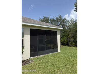 Exquisite 3-Bed, 3-Bath. 3-Car Garage Retreat in Halifax on Halifax Plantation Golf Club in Florida - for sale on GolfHomes.com, golf home, golf lot