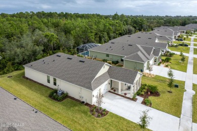 Exquisite 3-Bed, 3-Bath. 3-Car Garage Retreat in Halifax on Halifax Plantation Golf Club in Florida - for sale on GolfHomes.com, golf home, golf lot