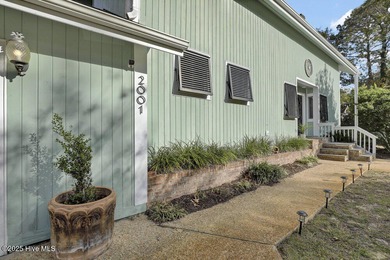 Custom built home with water access at the Olde Point Marina on on Olde Point Golf and Country Club in North Carolina - for sale on GolfHomes.com, golf home, golf lot