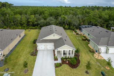 Exquisite 3-Bed, 3-Bath. 3-Car Garage Retreat in Halifax on Halifax Plantation Golf Club in Florida - for sale on GolfHomes.com, golf home, golf lot