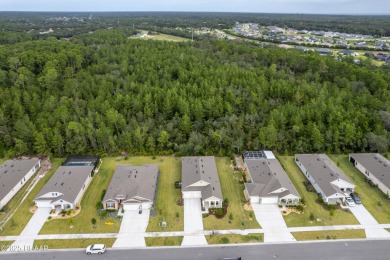 Exquisite 3-Bed, 3-Bath. 3-Car Garage Retreat in Halifax on Halifax Plantation Golf Club in Florida - for sale on GolfHomes.com, golf home, golf lot