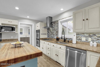 Custom built home with water access at the Olde Point Marina on on Olde Point Golf and Country Club in North Carolina - for sale on GolfHomes.com, golf home, golf lot